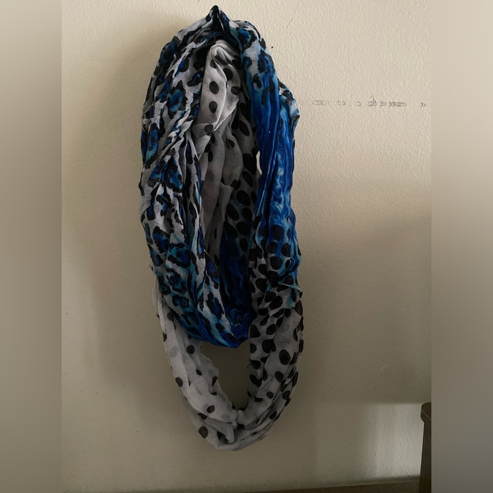 Woman’s polka dot and cheetah scarf